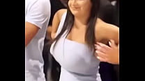 Gorgeous woman dancing with her huge tits and tight dress