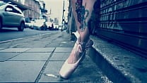 Ballerina Wearing Ballet Shoes and Walking Down The Street