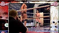 Dyke babes wrestle naked in a boxing ring