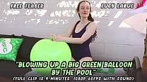 Blowing Up A Big Green Balloon by the Pool Blowing Up A Big Green Balloon by the Pool