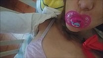the sucks the pacifier and takes your splash on her pretty face the sucks the pacifier and takes your splash on her pretty face