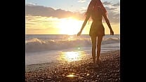 Sunset girl at the sea beach Sunset girl at the sea beach
