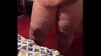BBW housewife oiling her curvacious body