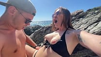 Hot brunette fucks a stranger on a public beach Hot brunette fucks a stranger on a public beach