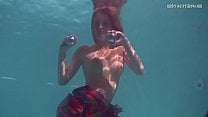 Redhead b Nikita Vodorezova gets naked fast underwater