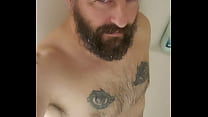 Anthony Arden stroking in the shower