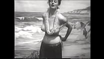 Playful lady with big melons takes off her Hawaiian outfit and shows her round ass on the beach Playful lady with big melons takes off her Hawaiian outfit and shows her round ass on the beach