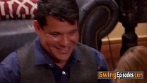 Sensual vibes in a room full of kinky swingers having a softcore orgy 