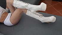 Perfect assed MILF in high heeled boots and fishnet stockings Perfect assed MILF in high heeled boots and fishnet stockings