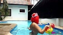 Asian redhead big tits in pool Asian redhead big tits in pool