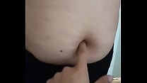 Milf enjoys a finger in the navel