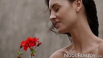 Sabrina G shows off natural tits and shaved pussy outdoor