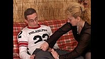 A boy seduced by a hot mature woman giving him a blowjob A boy seduced by a hot mature woman giving him a blowjob