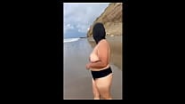 How nice chubby Mexican girl strips naked on the beach