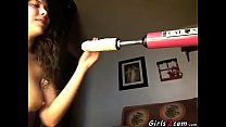 Brunette masturbates with a vibrator and a dildo machine