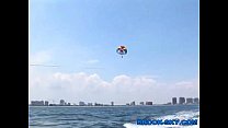 Bikinied Teens Parasailing