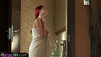Beautiful redhead orgasms in the bathroom
