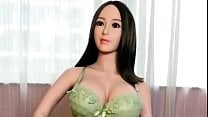 Hot asian love doll in green bikini with massive tits ready for doggystyle