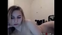Blonde teen masturbates with a pink dildo