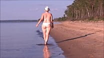 Juicy MILF with a big ass in a white bikini