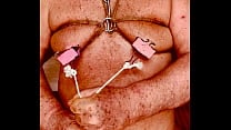 Seniormasochist pulls nipple clamps off
