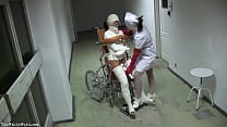 Patient in Wheelchair with Broken Legs and Straitjacket TheWhiteWard com