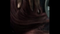 Red head gives head in car back seat