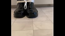 Rubber Boy Squeaks His Boots While Tied Up