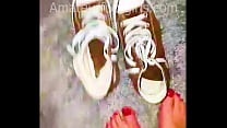 Girl shows her sweaty  stinky Converse sneaker shoes  the insoles are very sweaty and very stinky to wear from barefoot 