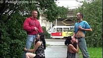 A pregnant girl in a public street foursome