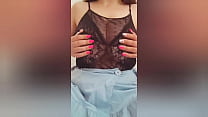 Shy brunette with pink manicure and big tits undresses in front of camera