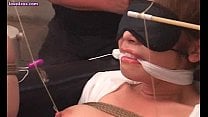 Tied up asian chick enjoys dildos