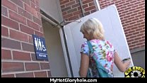 Ebony teen shows off her blowjob skills at gloryhole