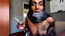 Desi in hijab smoking while wearing nipple clamps Desi in hijab smoking while wearing nipple clamps