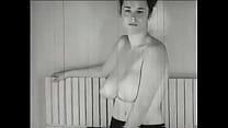 Mature brunette in black stockings excitedly caresses her beautiful breasts in an old porn movie Mature brunette in black stockings excitedly caresses her beautiful breasts in an old porn movie