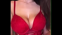 My friend 039 s mom is massaging her big tits in a red bodysuit