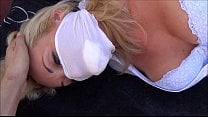 HOGTIE ON SUNLOUNGER FOR ELEGANT BLONDE
