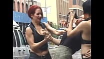 Two lustful lesbians tie their redhead girlfriend to a pole on the street and beat her with a whip Two lustful lesbians tie their redhead girlfriend to a pole on the street and beat her with a whip