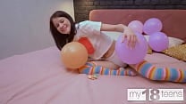 MY18TEENS Skinny girl with small tits blows up balloons and fucks herself with a dildo