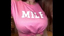 MILF with big tits in a pink T shirt